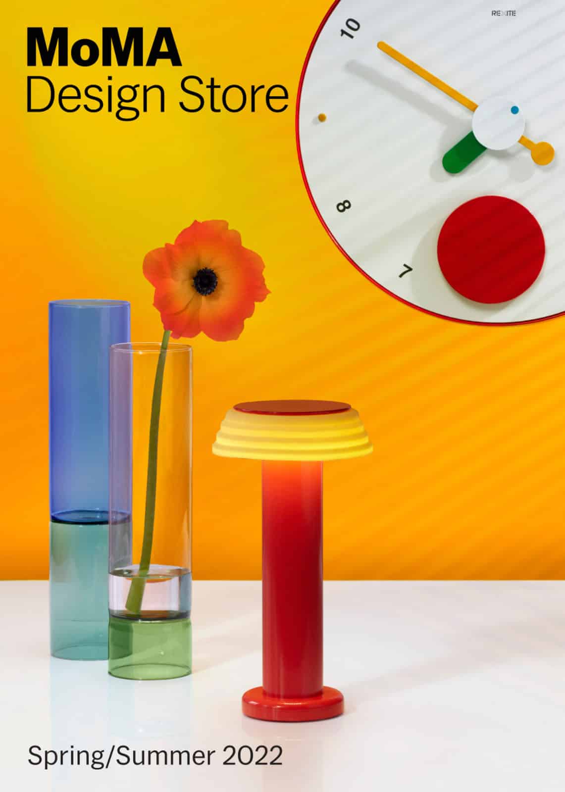 MoMA Spring catalog cover showing a table, a clock, and some vases with beautiful reds and yellows.