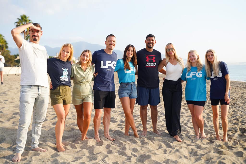 Small group of Publitas employees on the beach.