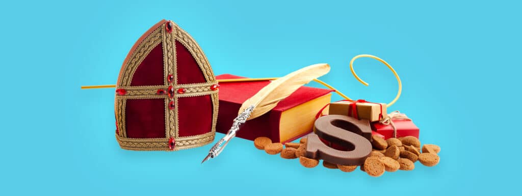 Typical Sinterklaas items in a collage. Pepernoten, chocolate letters, gifts, etc.